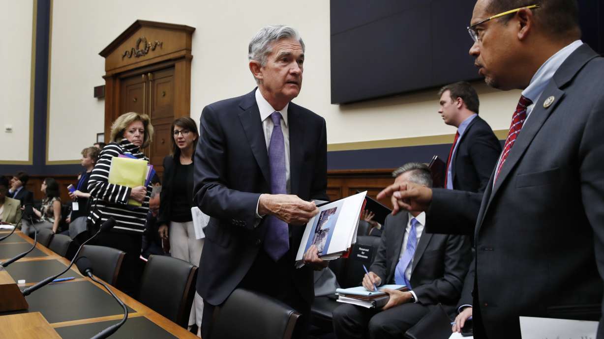 Fed says trade war downturn could pose challenges