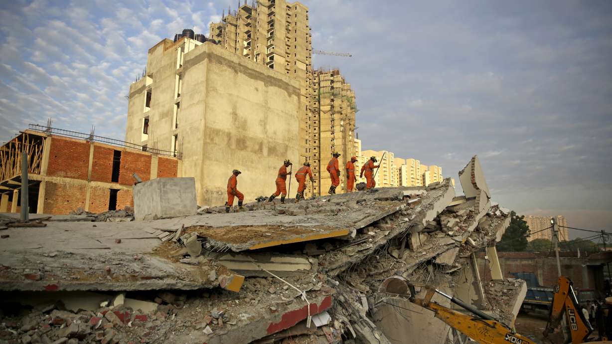 Rescuers find 9 bodies after 2 buildings collapse in India