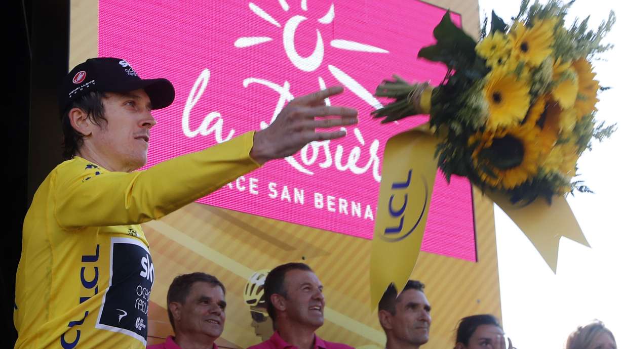 Rowdy Tour fans tarnish win for Thomas atop Alpe d'Huez