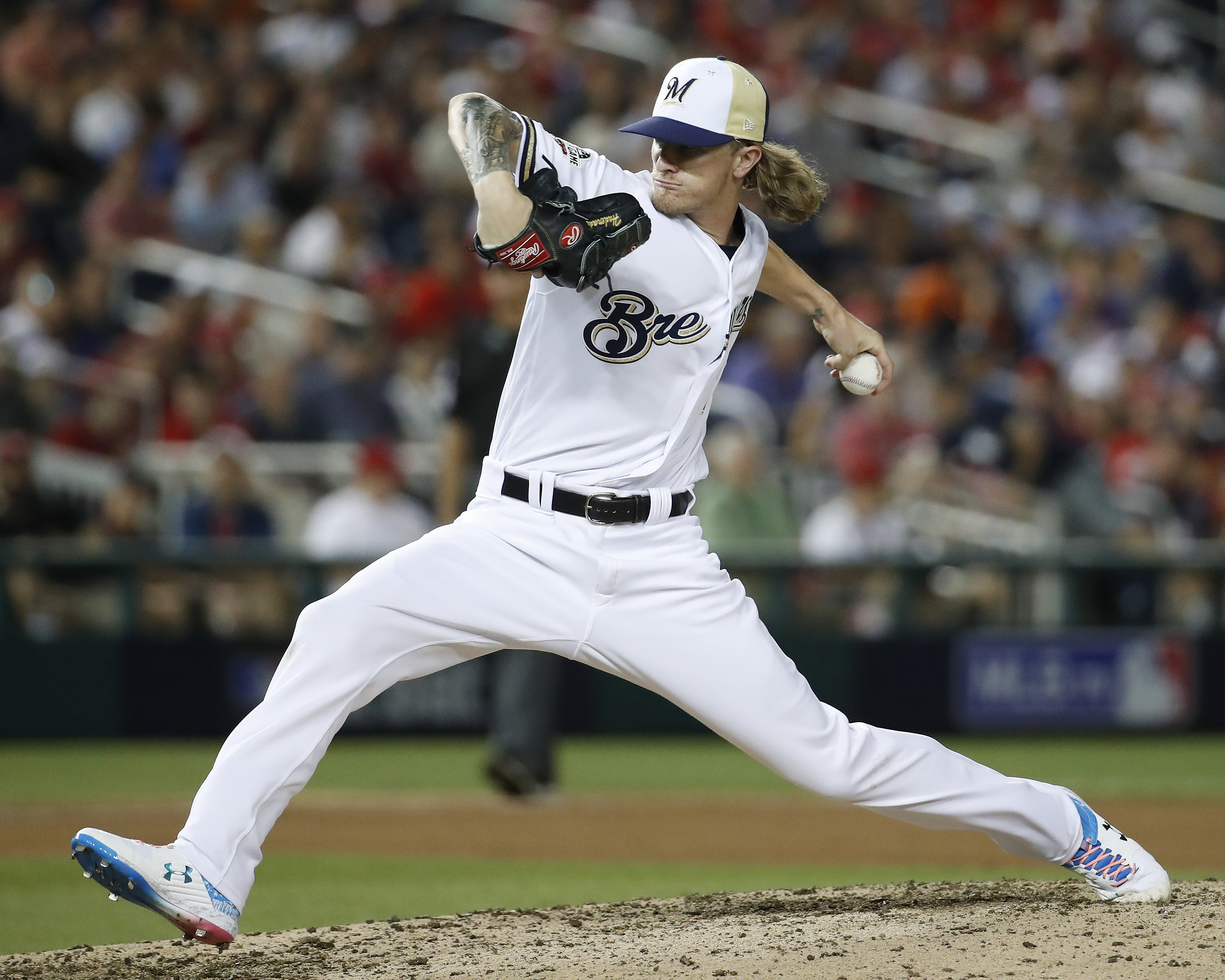 Hader challenged to 're-earn the trust' of Brewers teammates