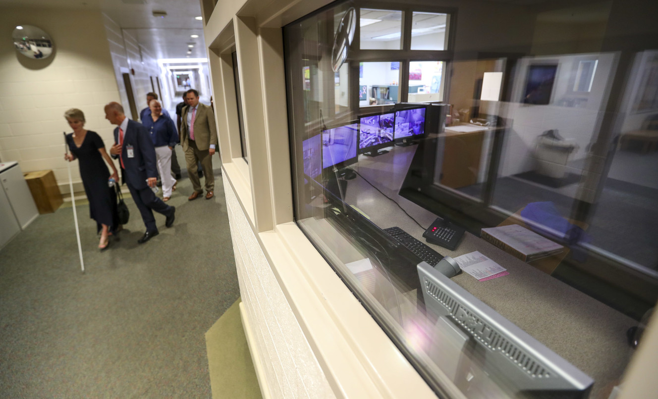 Kristen Cox, executive director of the Governor's Office of Management and Budget, and Dallas Earnshaw, Utah State Hospital superintendent, lead a tour of the Inpatient Forensic Restoration Unit at the Provo hospital on Thursday, July 19, 2018. (Photo: Steve Griffin, KSL)