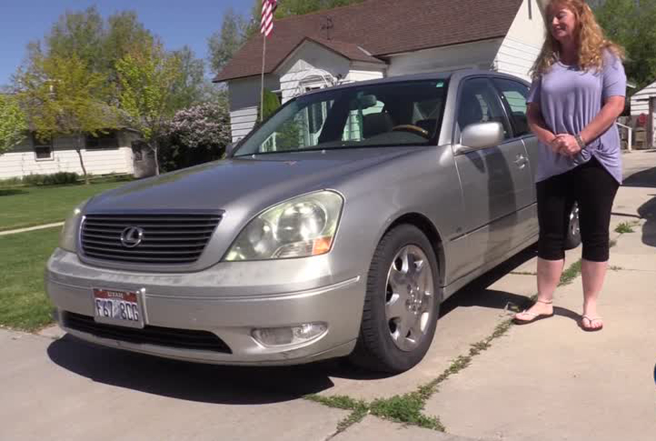 Michelle McNair thought she stumbled onto a small windfall when someone wanted to pay her $400 a week to wrap a big vinyl ad around her car. Photo: KSL TV