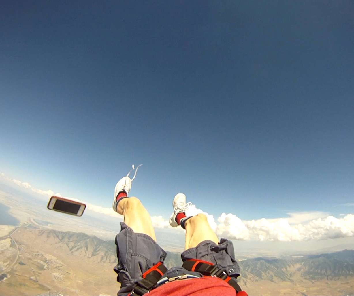 Patrick Wiggins saw something fly out of his shorts pocket while in the middle of a skydiving jump at 13,200 feet. It turned out to be his cell phone, which he later found on the ground without a scratch. (Photo courtesy of Patrick Wiggins)