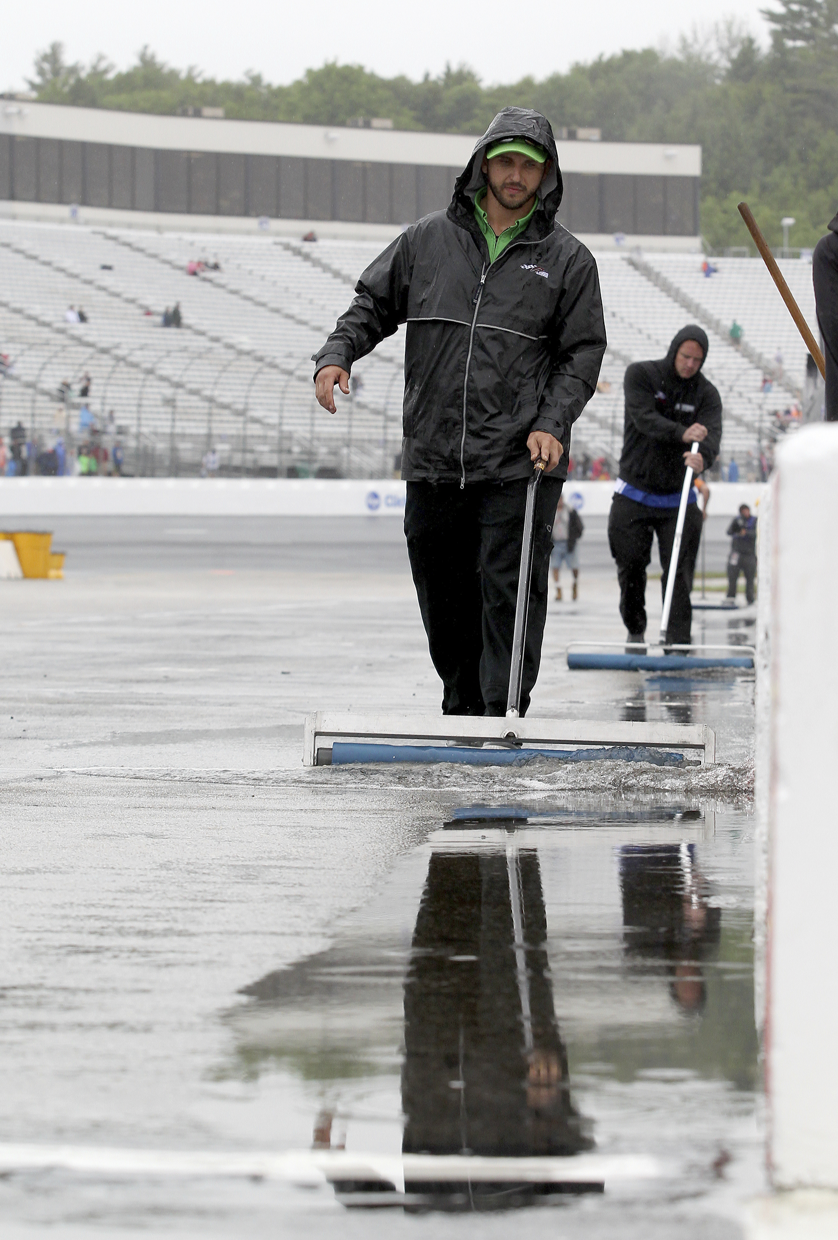 The Latest: Harvick wins at New Hampshire in thriller