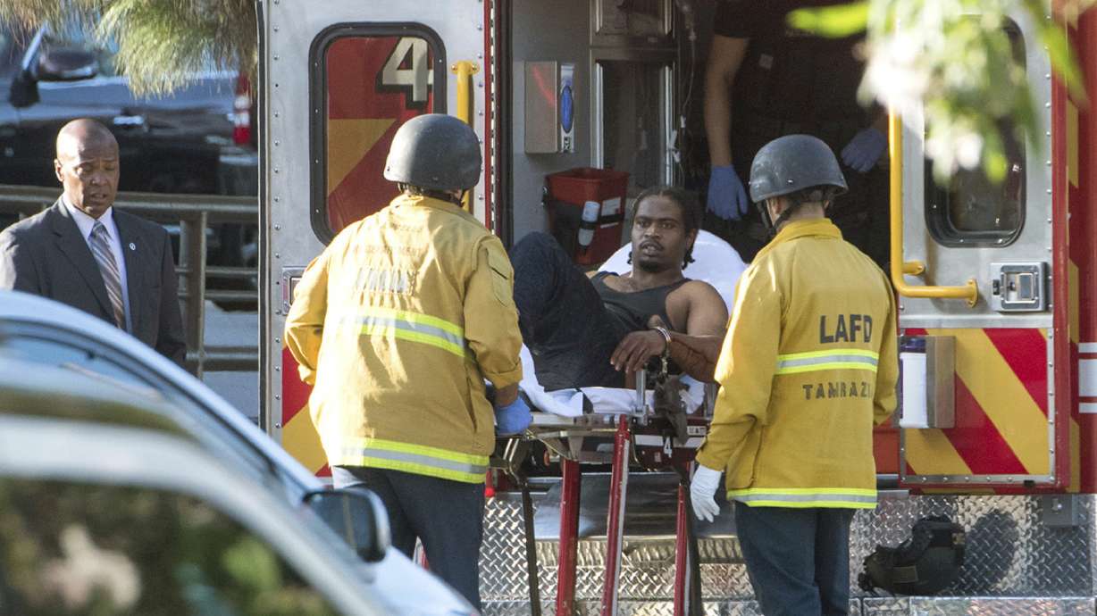 Deadly LA market shooting started with domestic feud