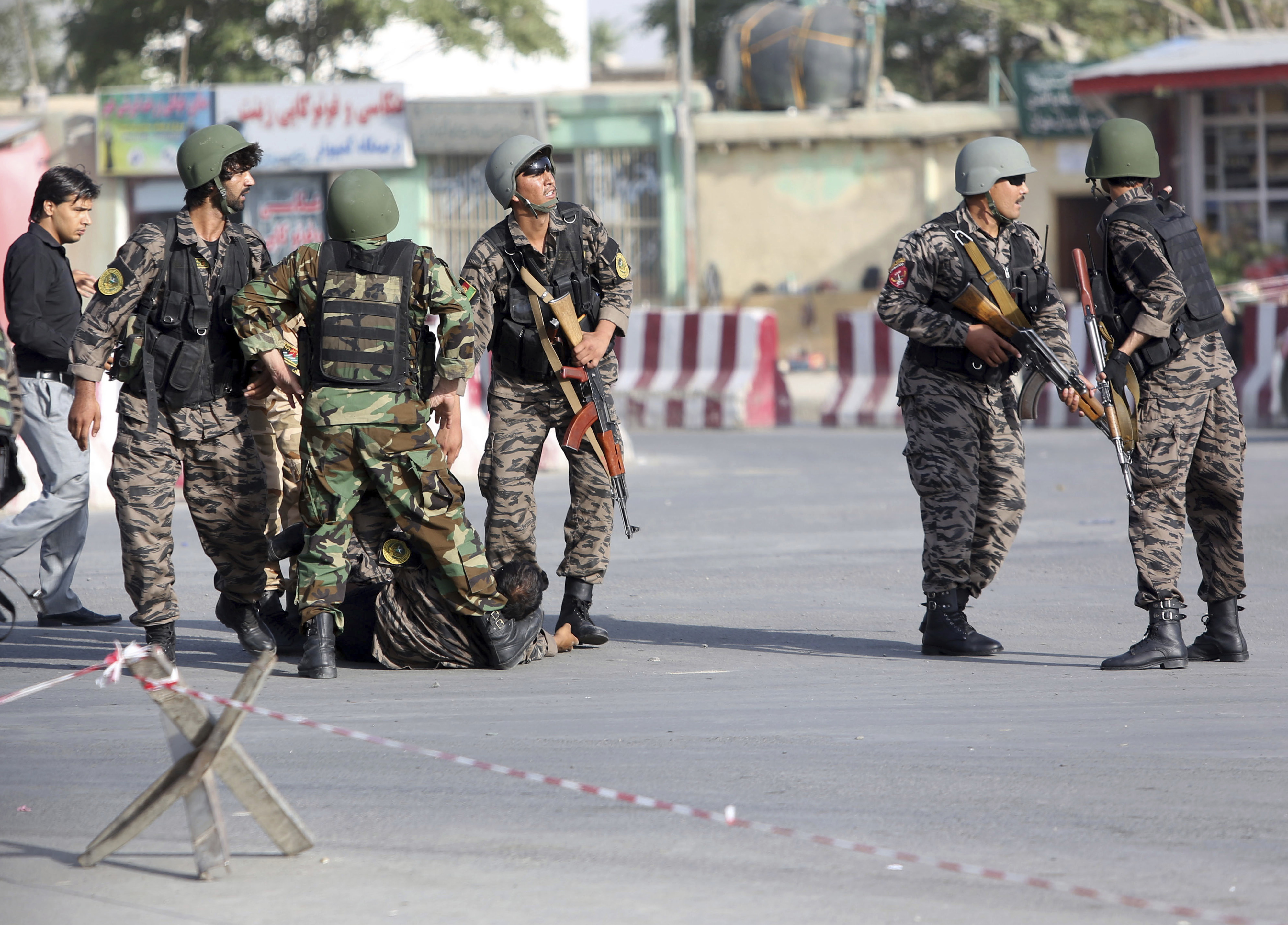 Official: Gunmen kill 4 civilians in mosque in Afghanistan