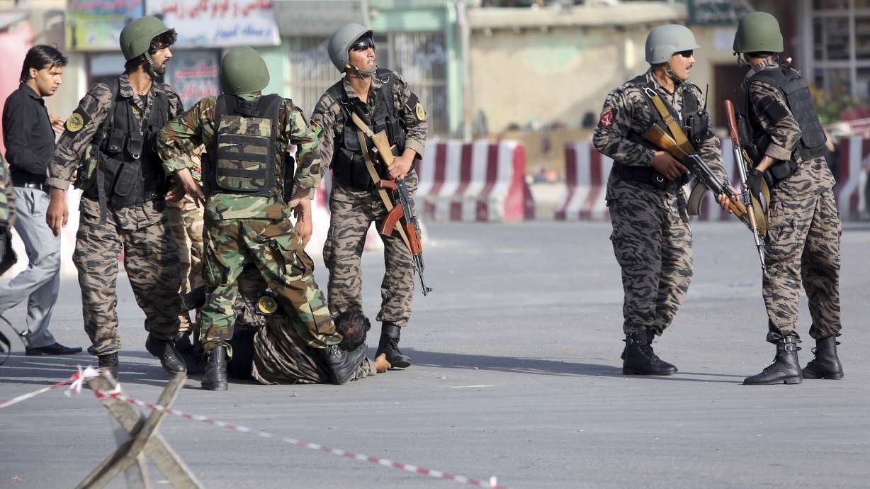 Official: Gunmen kill 4 civilians in mosque in Afghanistan