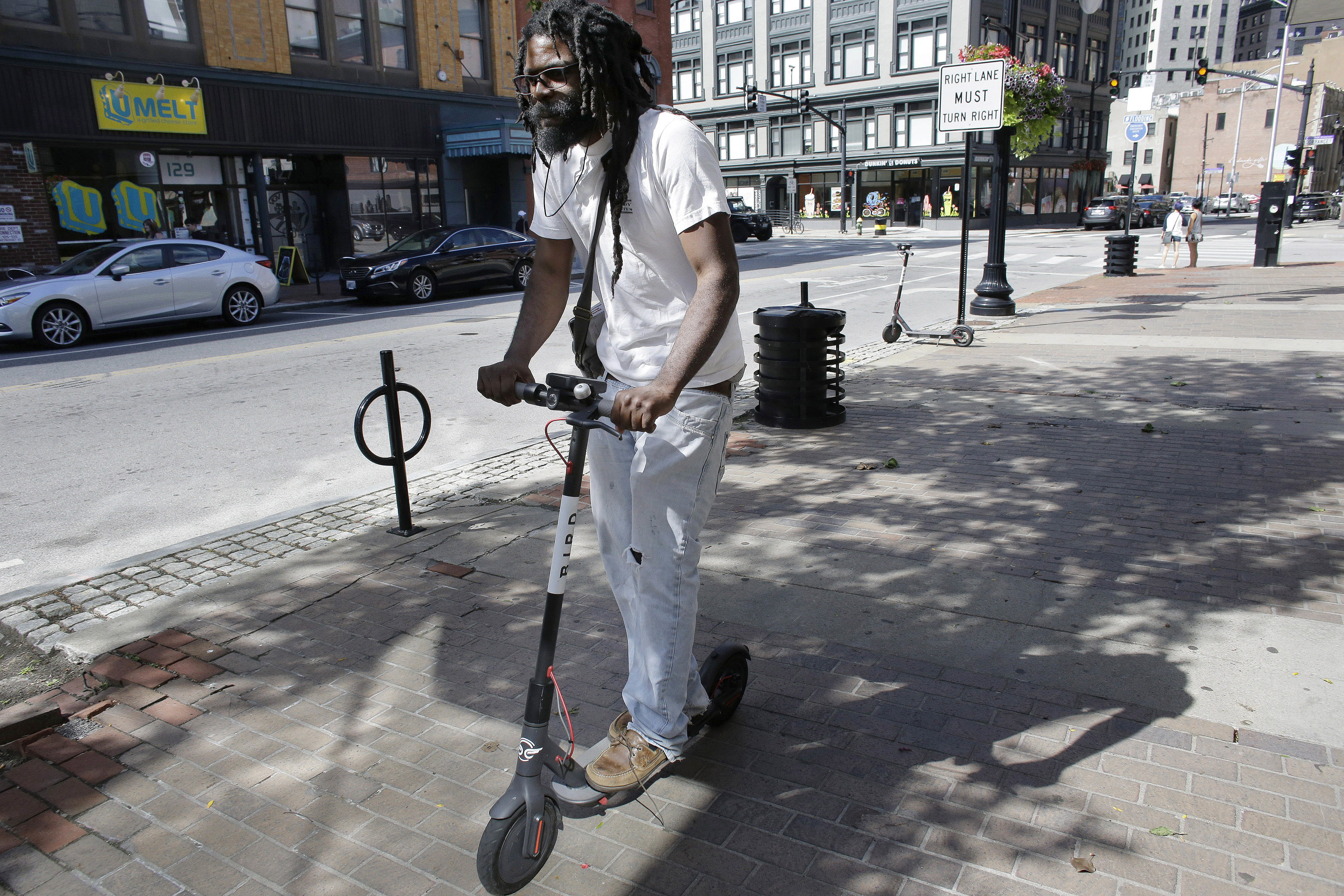 New England cities scramble to regulate electric scooters