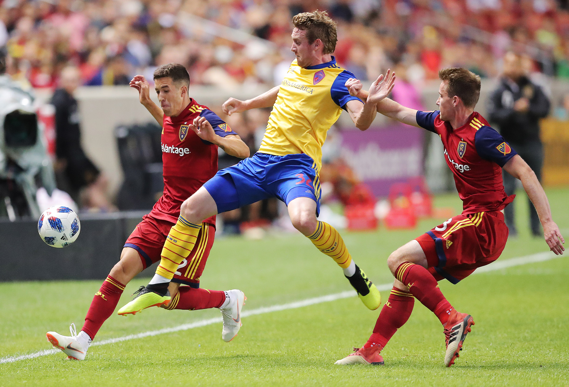 Real Salt Lake defender Aaron Herrera (22) and Real Salt Lake midfielder Nick Besler (13) battle Colorado Rapids midfielder Jack McBean (32) for the ball as Real Salt Lake and the Colorado Rapids play at Rio Tinto Stadium in Sandy on Saturday, July 21, 2018. (Photo: Scott G Winterton, Deseret News)