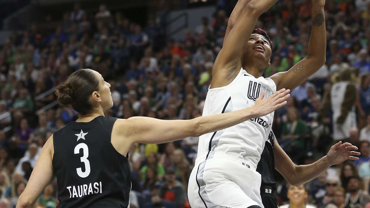 Moore wins third MVP award as Parker beats Delle Donne