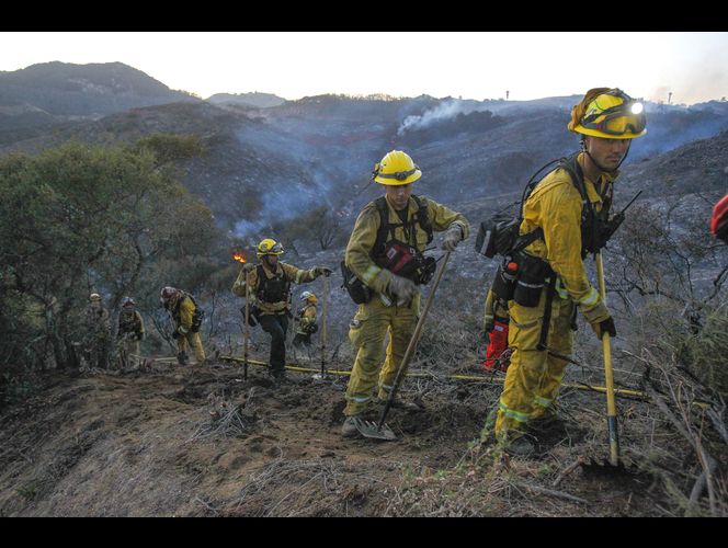 Hope grows as deadly Northern California blaze slows down