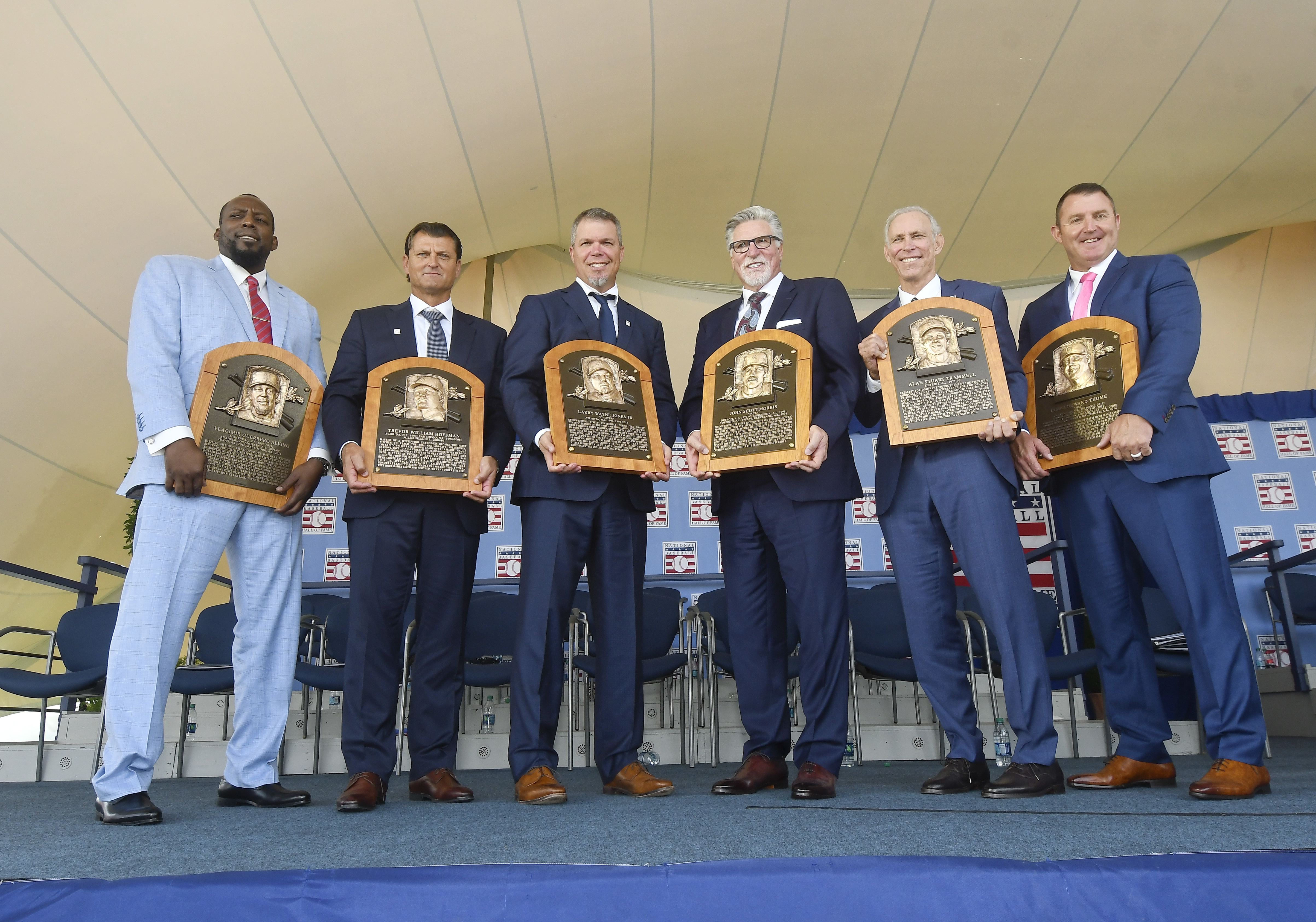 Baseball Hall of Famers from left, Vladimir Guerrero, Trevor Hoffman, Chipper Jones, Jack Morris, Alan Trammell, and Jim Thome, hold their plaques after an induction ceremony at the Clark Sports Center on Sunday, July 29, 2018, in Cooperstown, N.Y. (Photo: Hans Pennink, AP Photo)
