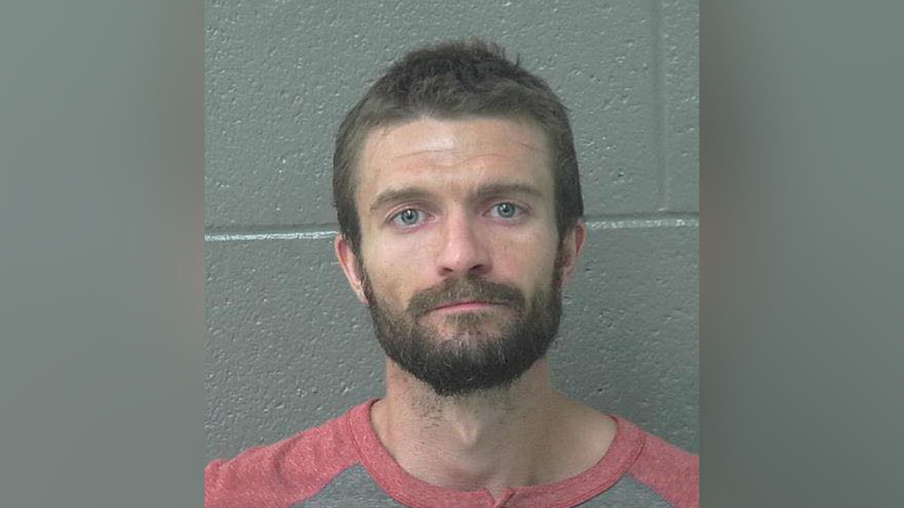 Park City man arrested for assault, impersonating officer