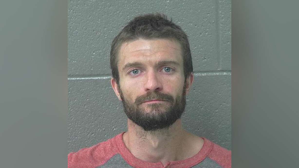 Park City man arrested for assault, impersonating officer