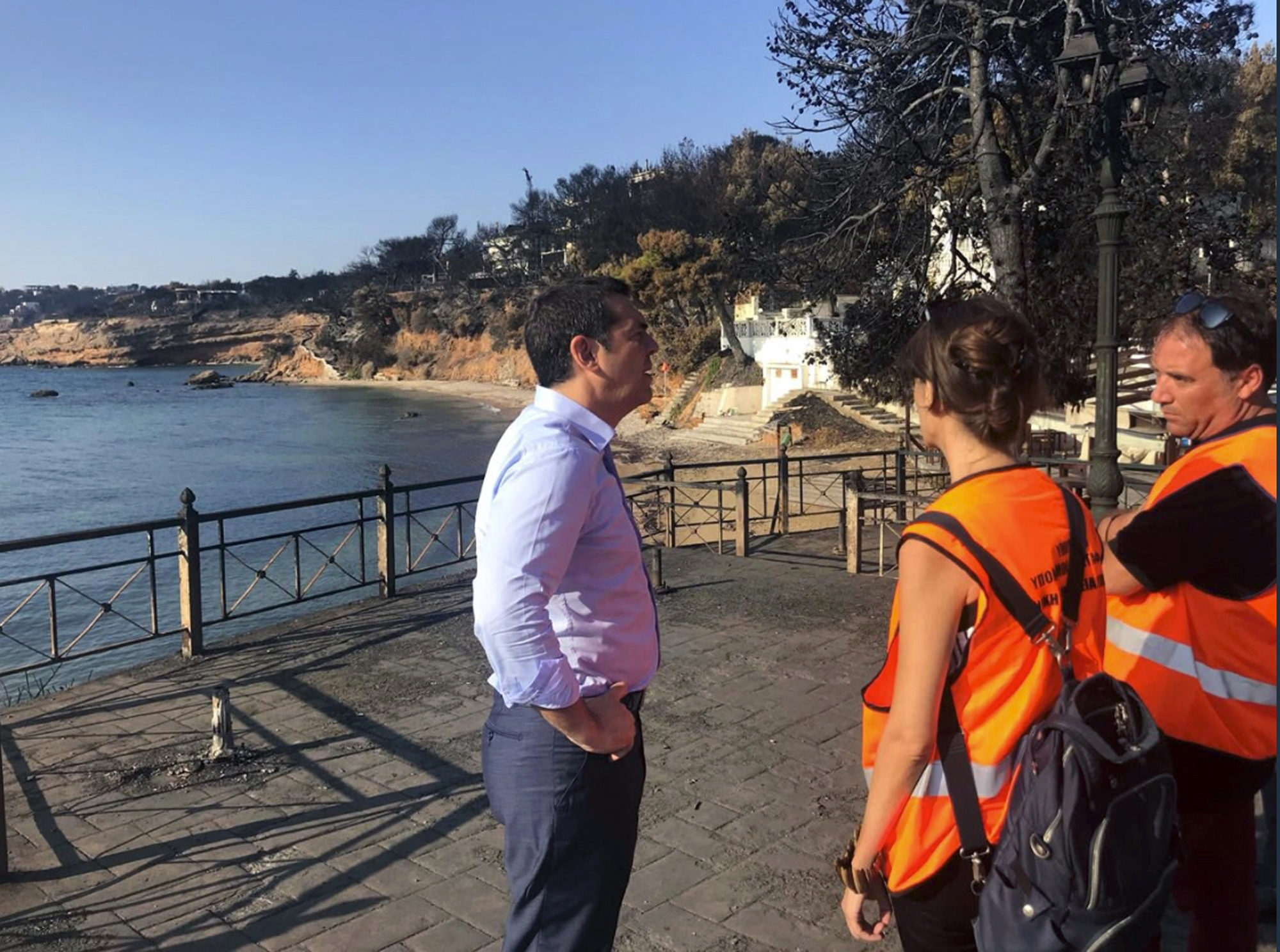 Greece: Divers recover body offshore of where wildfire raged