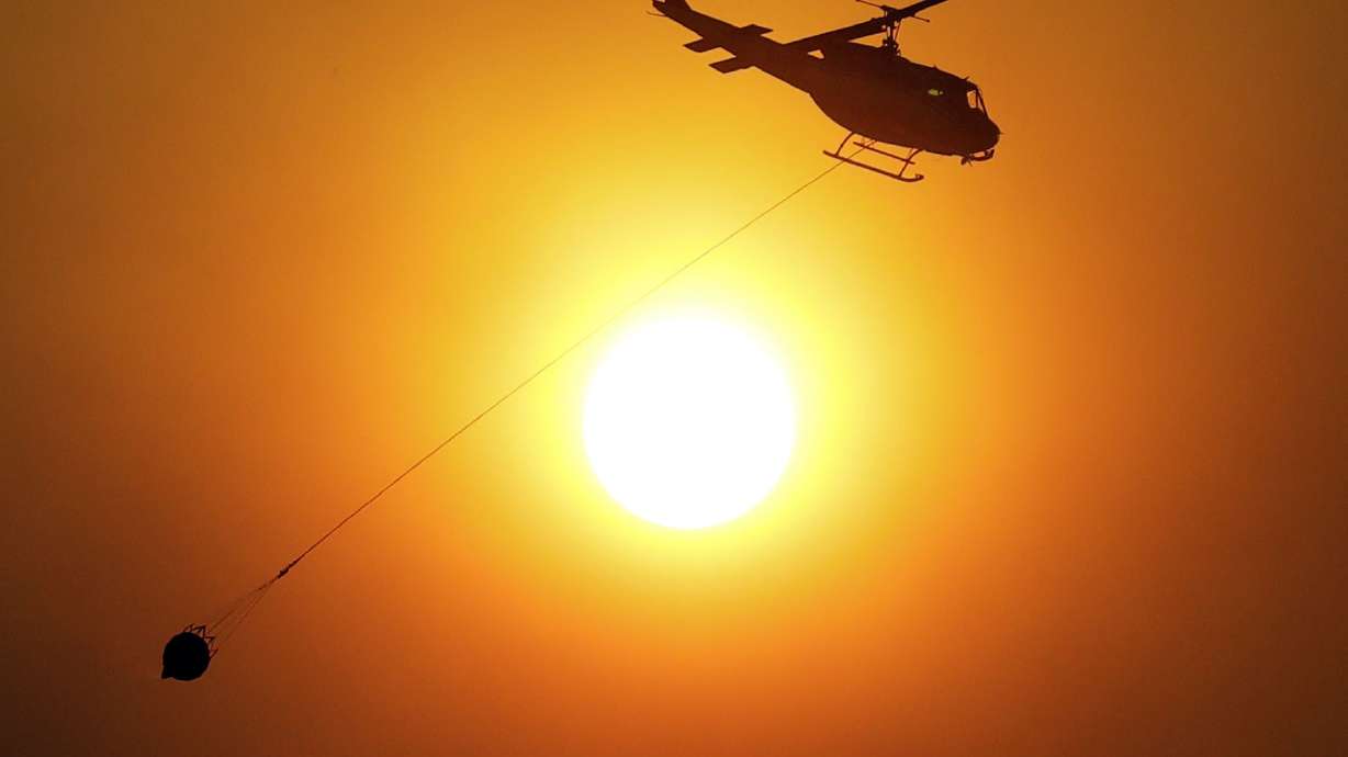 The Latest: Northern California fire victim identified