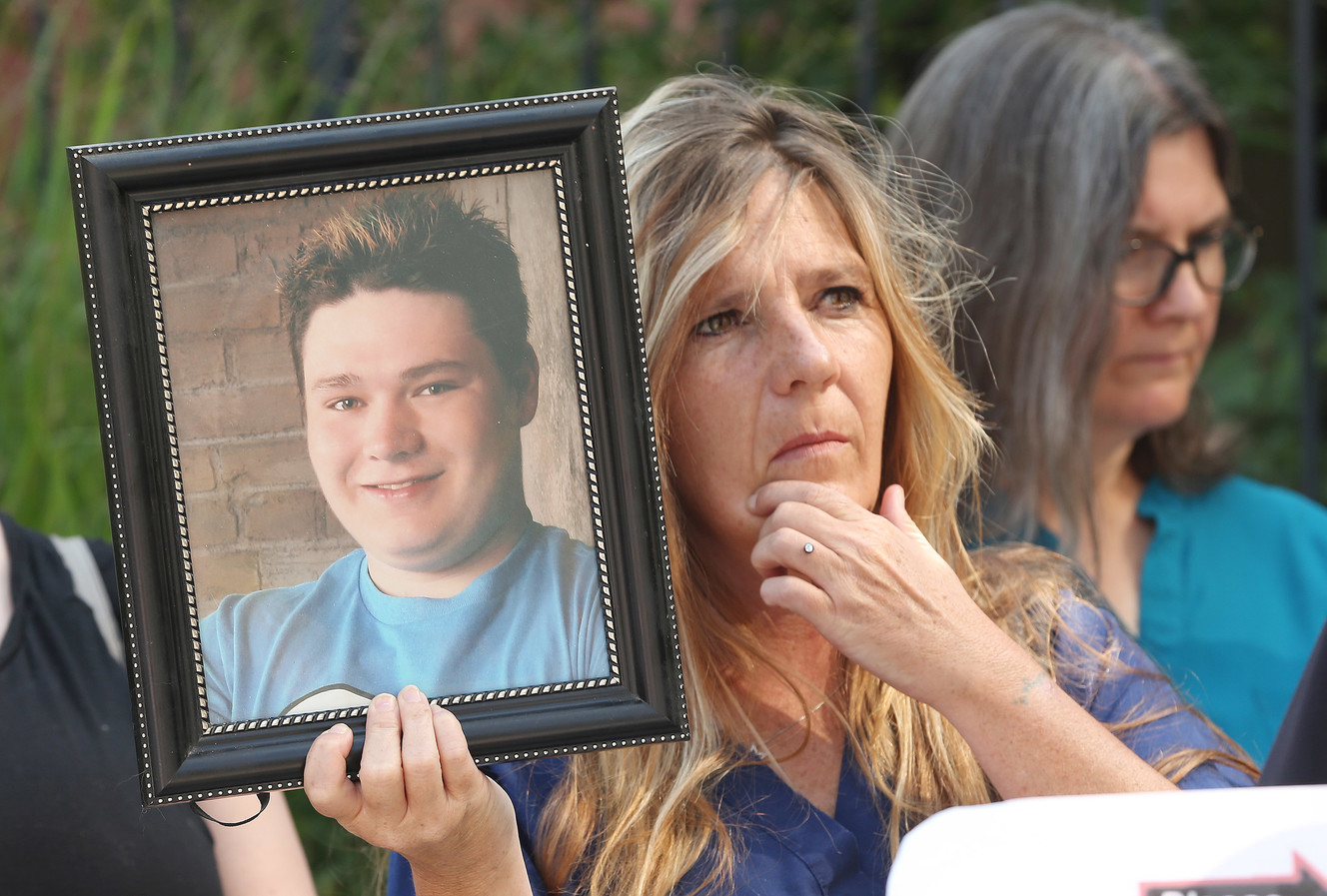 Tina Ross holds a photo of her deceased son Ryan Bush during a press in Salt Lake City on Tuesday, July 31, 2018. The Utah Cold Case Coalition has declared August as Cold Case Month. Rewards will be offered in all 200 of Utah’s unsolved murders and disappearances. (Photo: Jeffrey D. Allred, KSL)