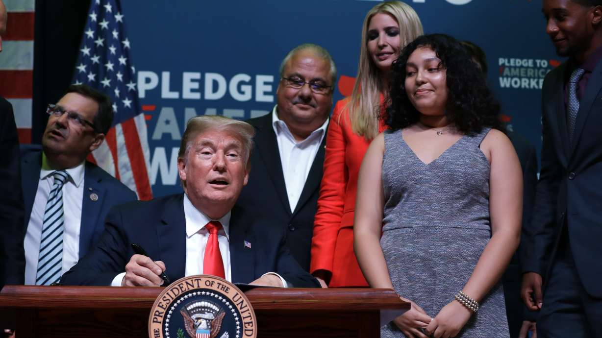 Promoting voter ID, Trump claims ID needed to buy groceries