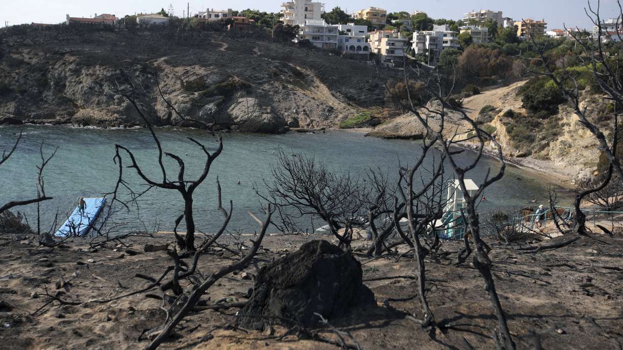 Official death toll from Greek fire raised to 87, 1 missing
