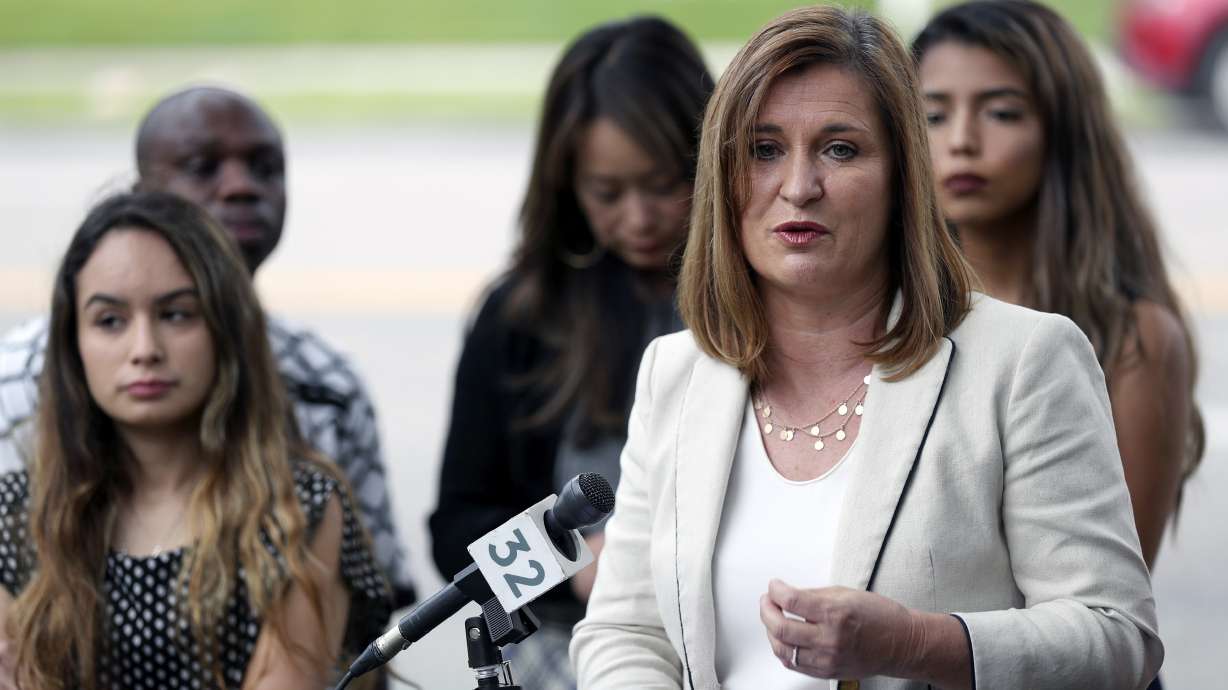 Jenny Wilson calls on Mitt Romney to 'come out of hiding' during speech on immigration