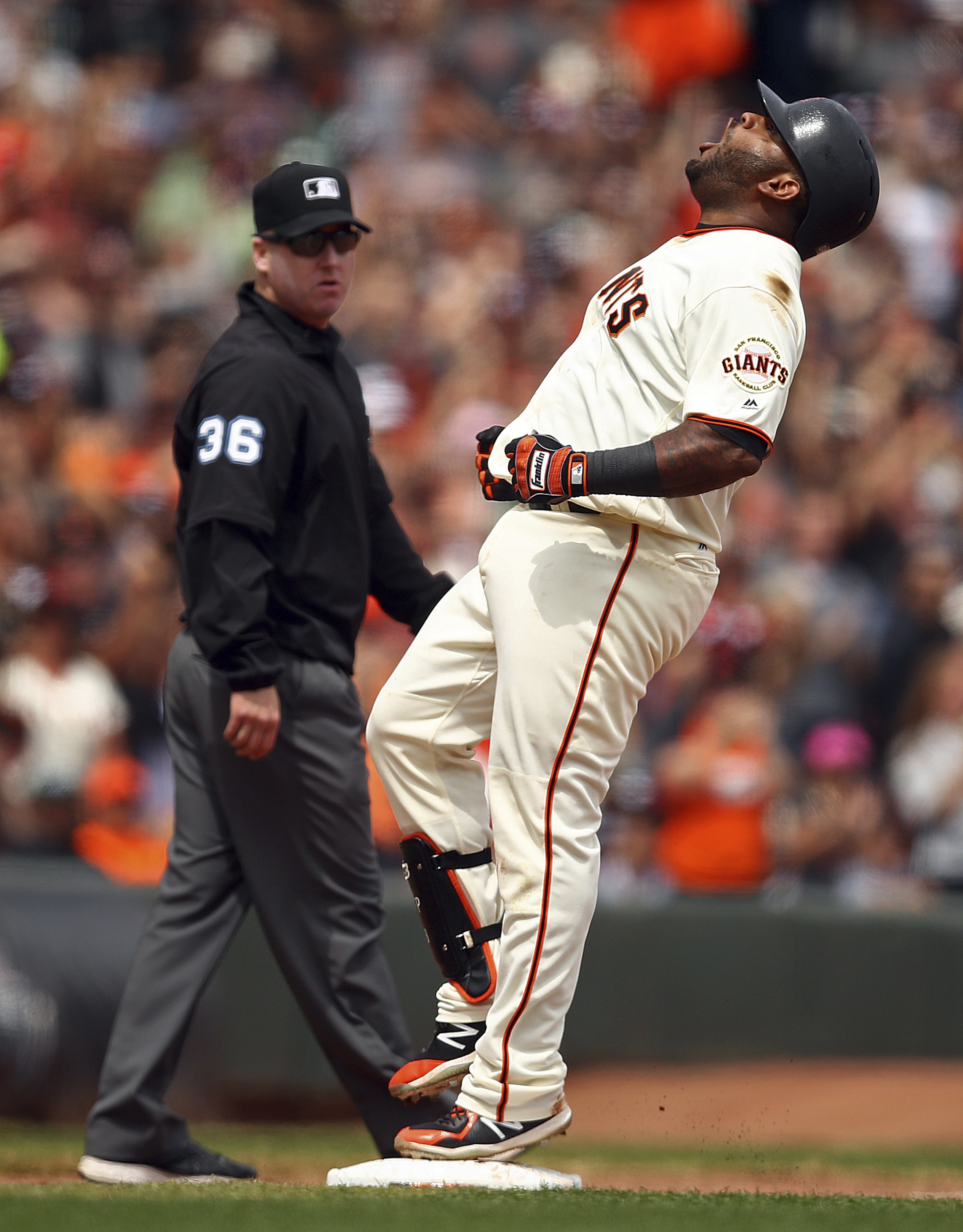 San Francisco Giants' Pablo Sandoval, right, celebrates his two