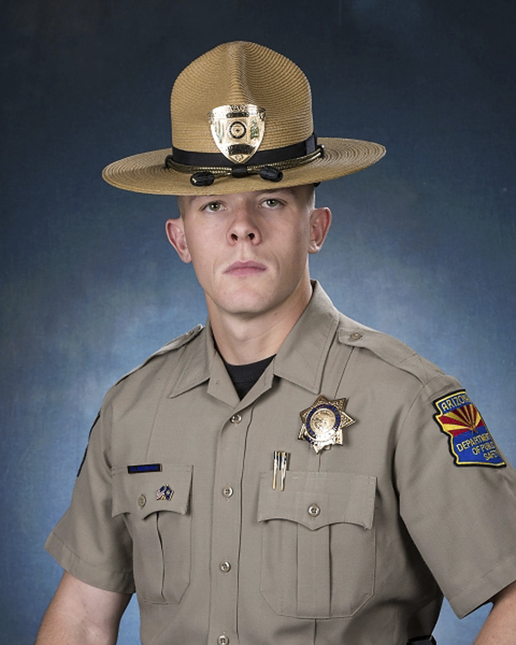 The Latest: Mourners bid final farewell to state trooper
