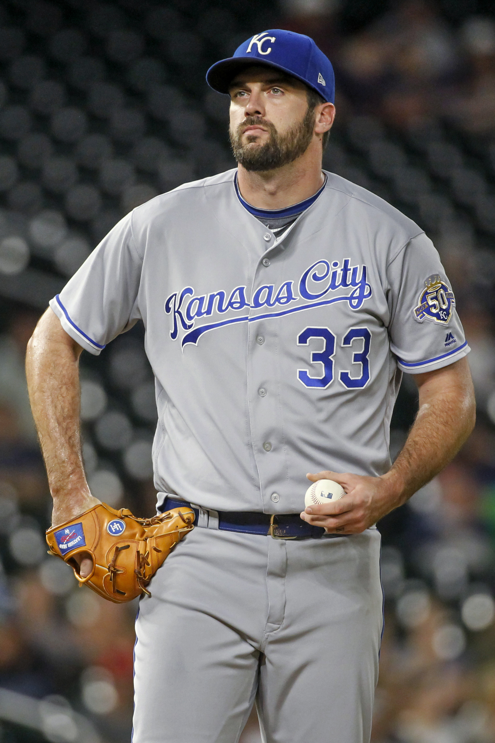 Twins wait through rain delays to beat Royals 6-4