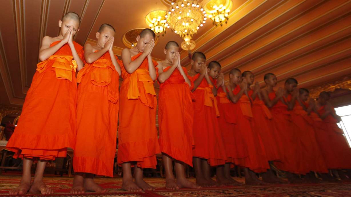 Thailand's rescued cave boys end stay at Buddhist temple