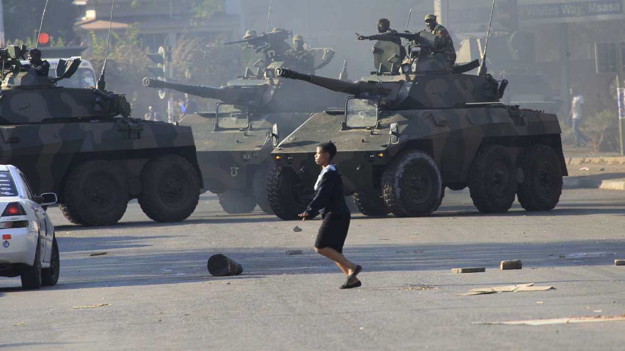 As Zimbabwe's leader preaches a new era, military a concern