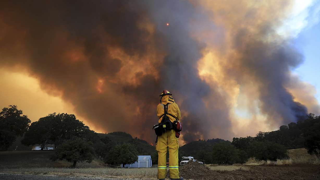 The Latest: Evacuation orders issued for parts of 2 counties