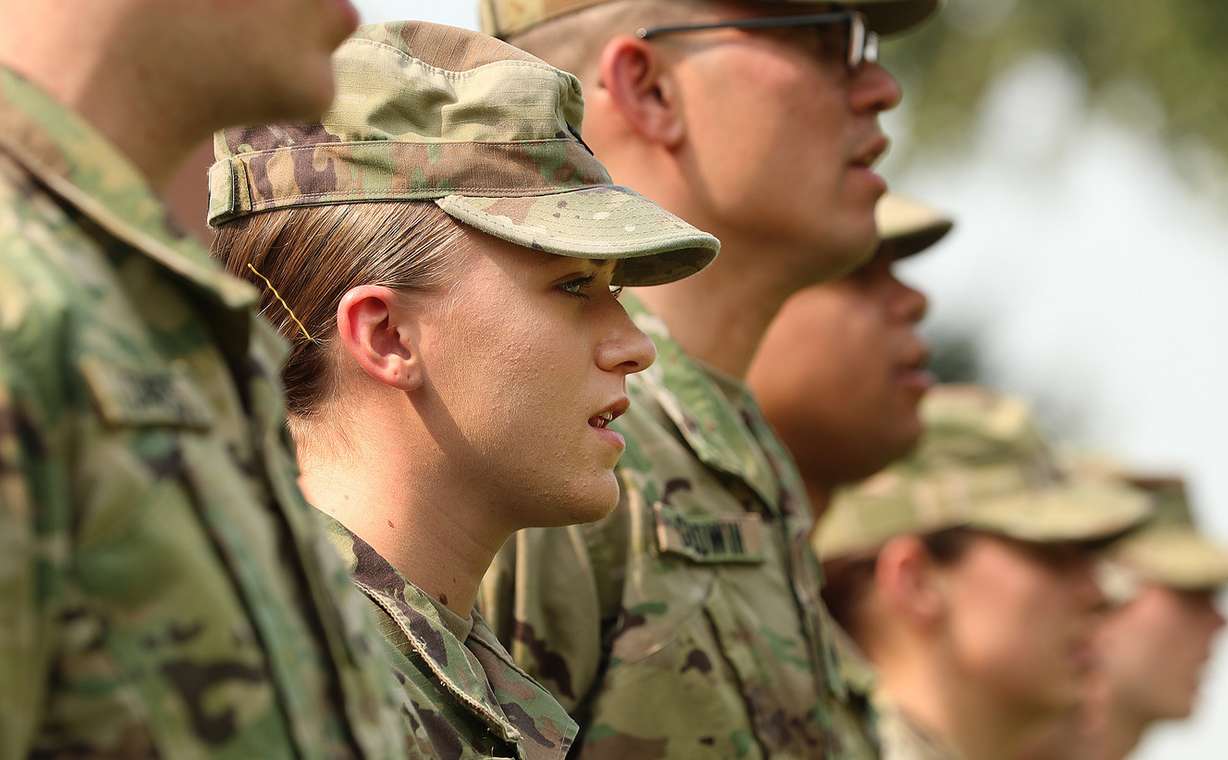 Spc. Abigail Shaw joins with other members of the 191st Combat Sustainment Support Battalion in singing "The Army Goes Rolling Along" as they take part in a deployment farewell ceremony at Fort Douglas in Salt Lake City on Saturday, Aug. 4, 2018. (Photo: Scott G Winterton, KSL)