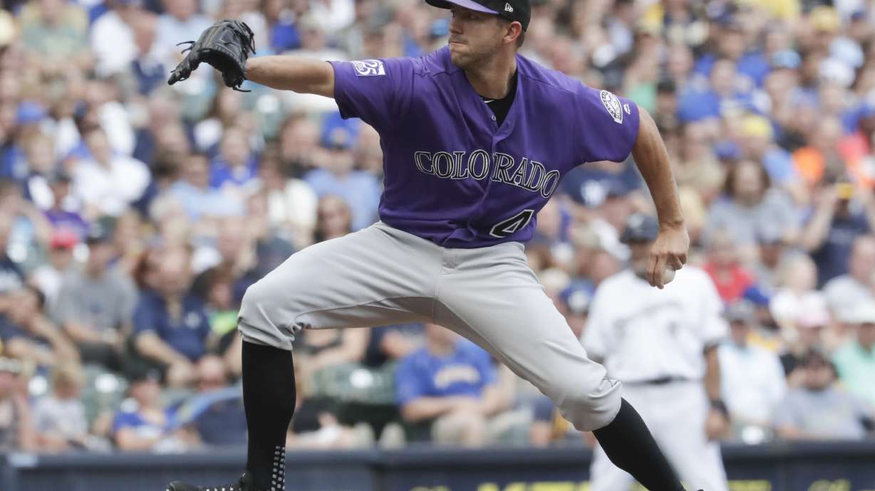 Shaw, Peralta lift Brewers to 8-2 win over Rockies