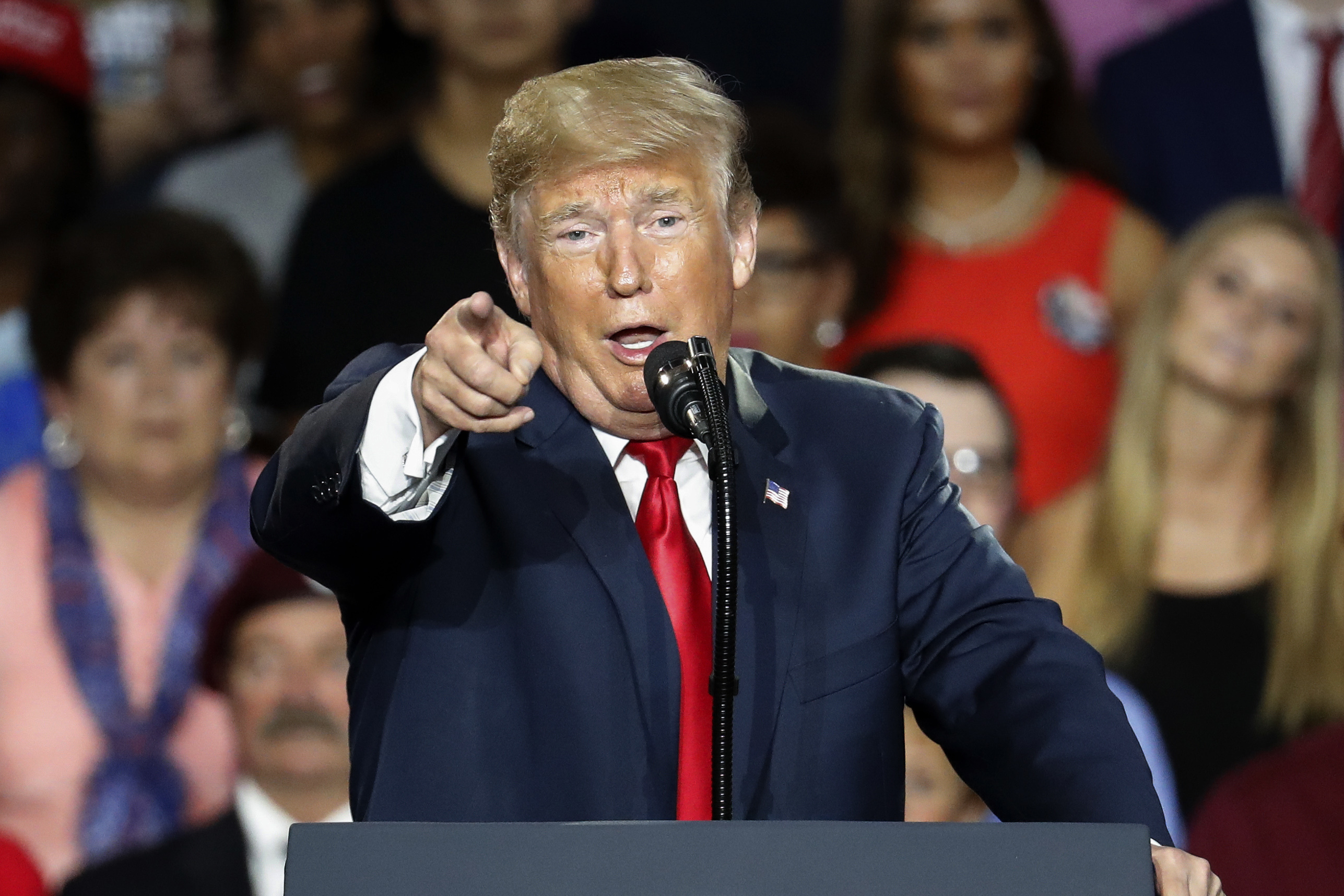 The Latest: Trump appears to change his story about meeting
