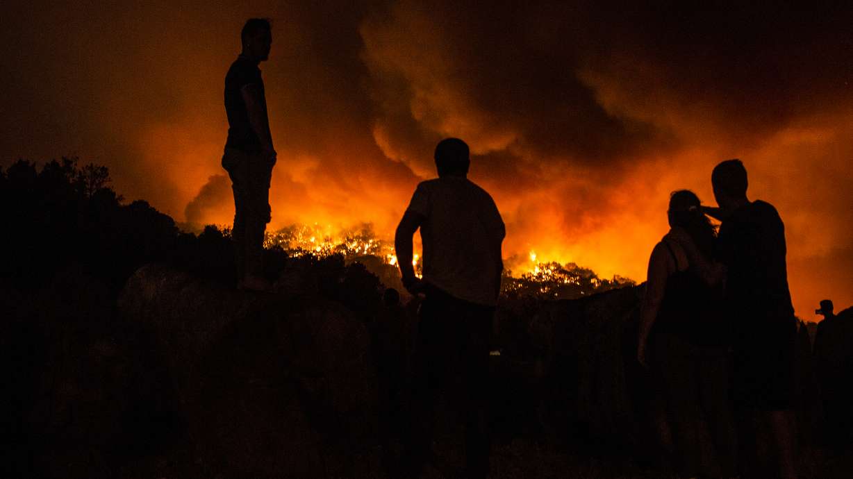 The Latest: EU: Wildfires show impact of climate change