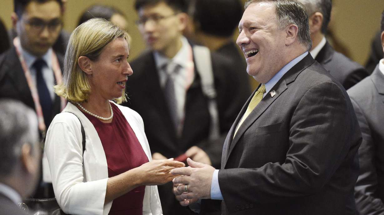 The Latest: Trump re-imposes many sanctions on Iran