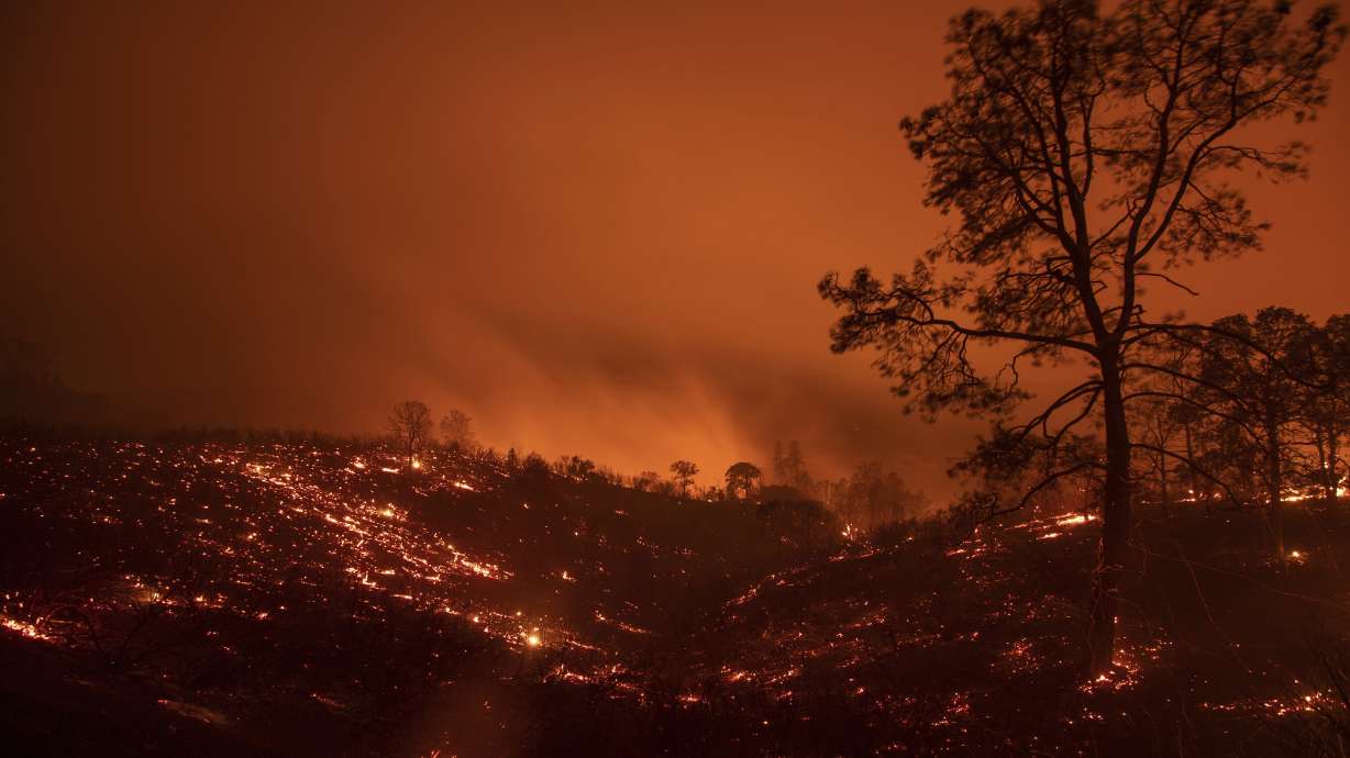The Latest: Southern California fire expanding into forest