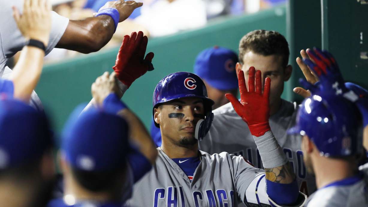 Baez homers, Hamels sharp again in Cubs' 3-1 win over Royals