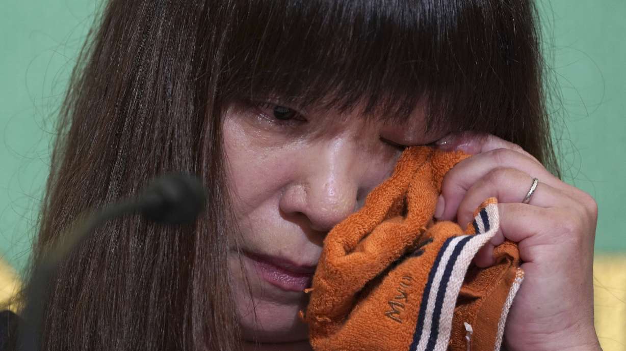 Wife of missing Japanese journalist makes tearful appeal