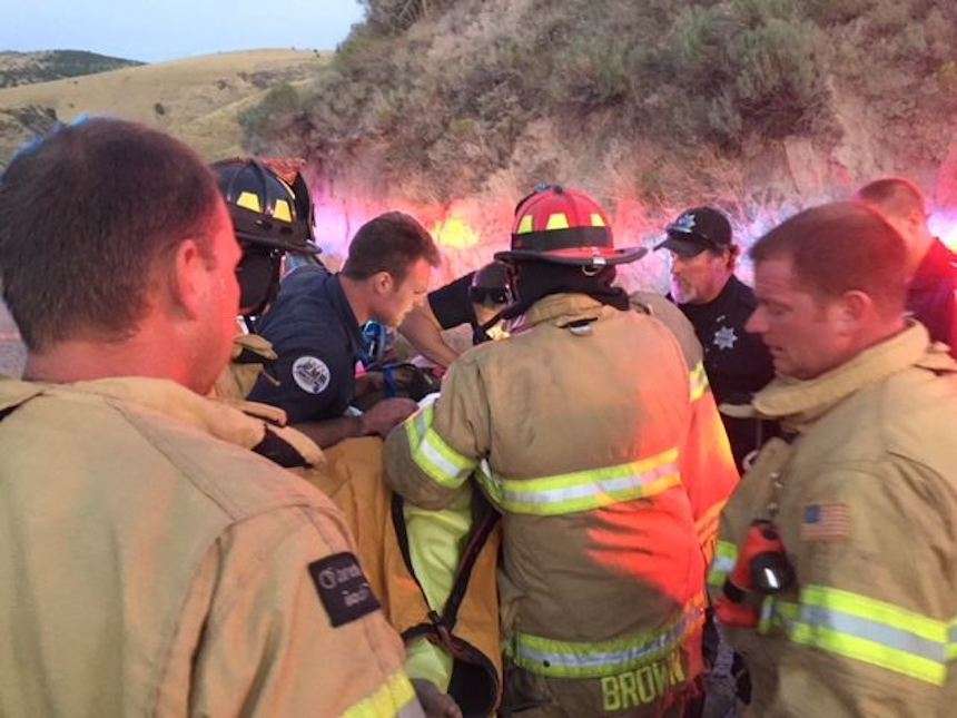 Emergency responders work to rescue a 21-year-old man pinned underneath a pickup truck in the mountains southeast of Idaho Falls, Idaho. The man had been missing for several days but was was in stable condition when he was found Monday, Aug. 6, 2018. (Photo: Idaho Falls Fire Department)