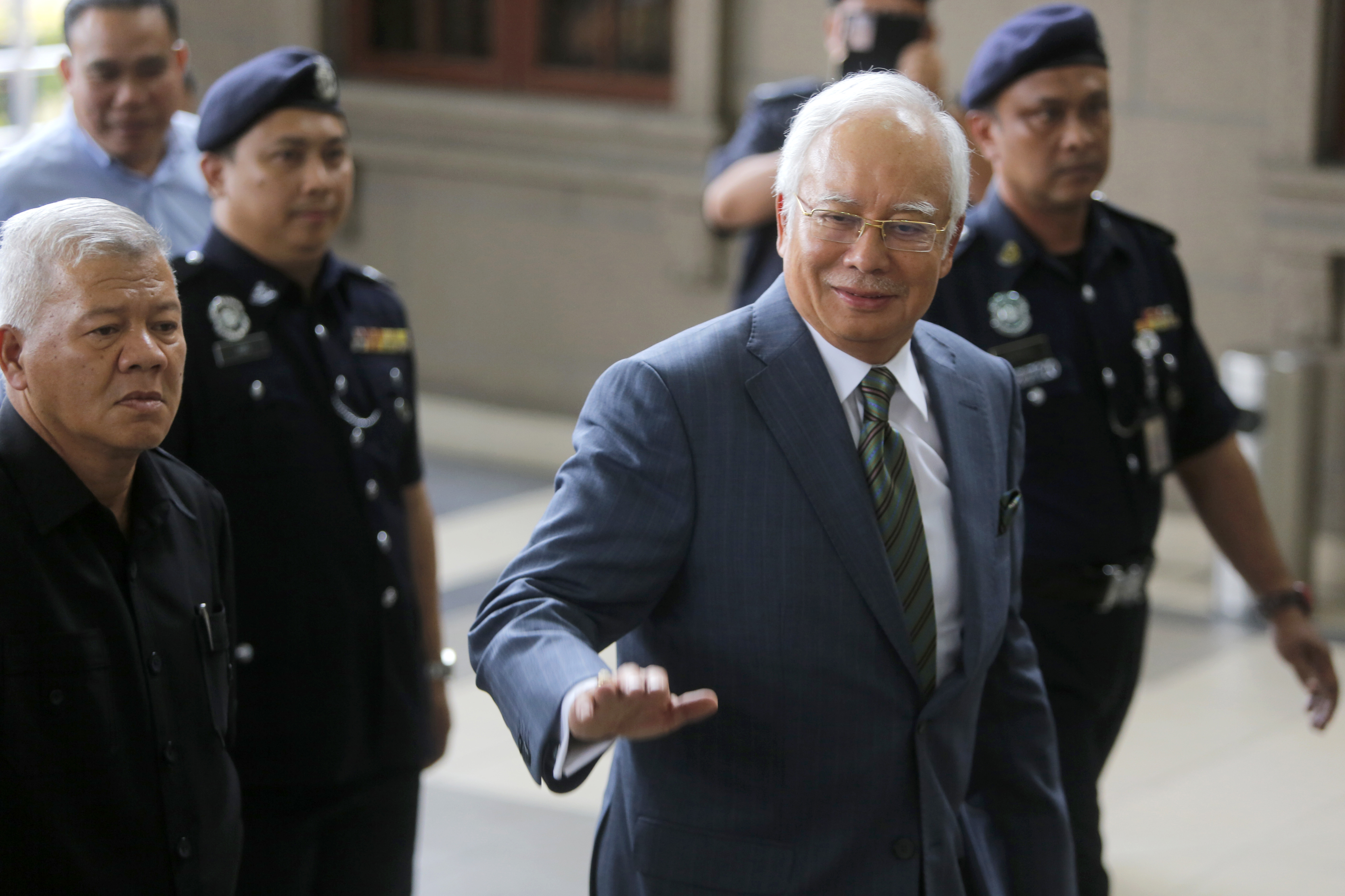 The Latest: Najib pleads not guilty to money laundering