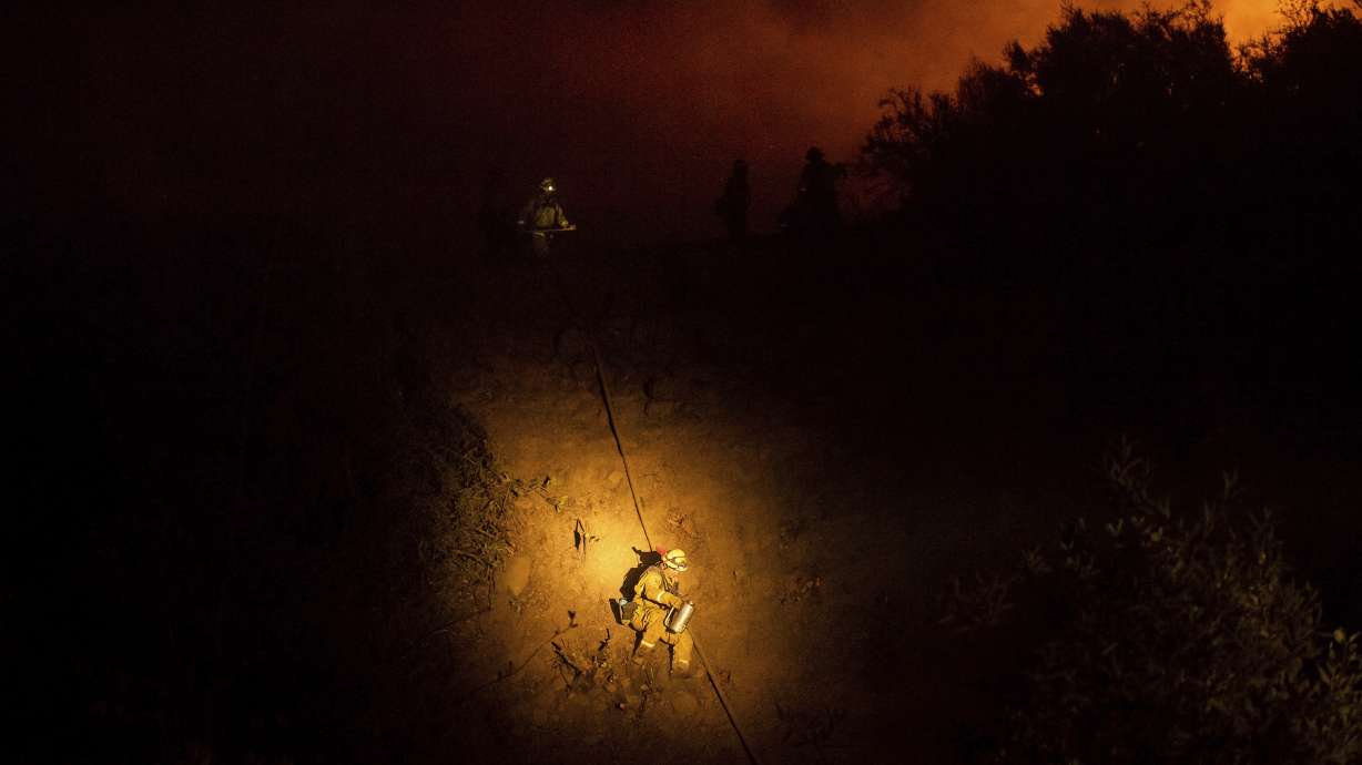 The Latest: Progress made on California's largest wildfire