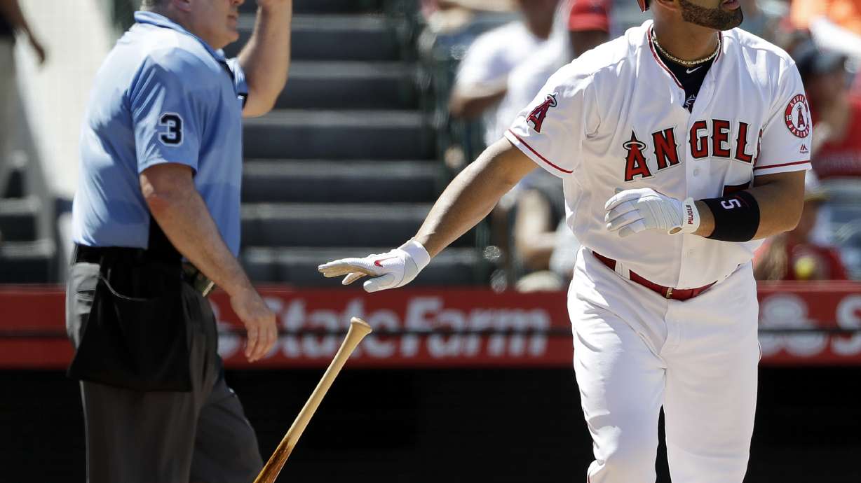 Upton, Pujols, Calhoun homer in Halos' 6-0 win over Tigers