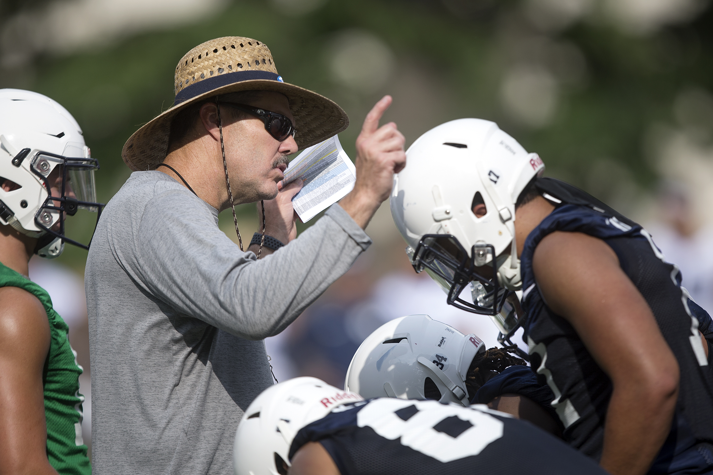 BYU offensive coordinator Jeff Grimes talks to his players during the Cougar's first football practice at BYU in Provo on Thursday, Aug. 2, 2018. Grimes was the offensive line coach at LSU when the then-No. 22 Tigers lost to Troy, 24-21 in 2017.
