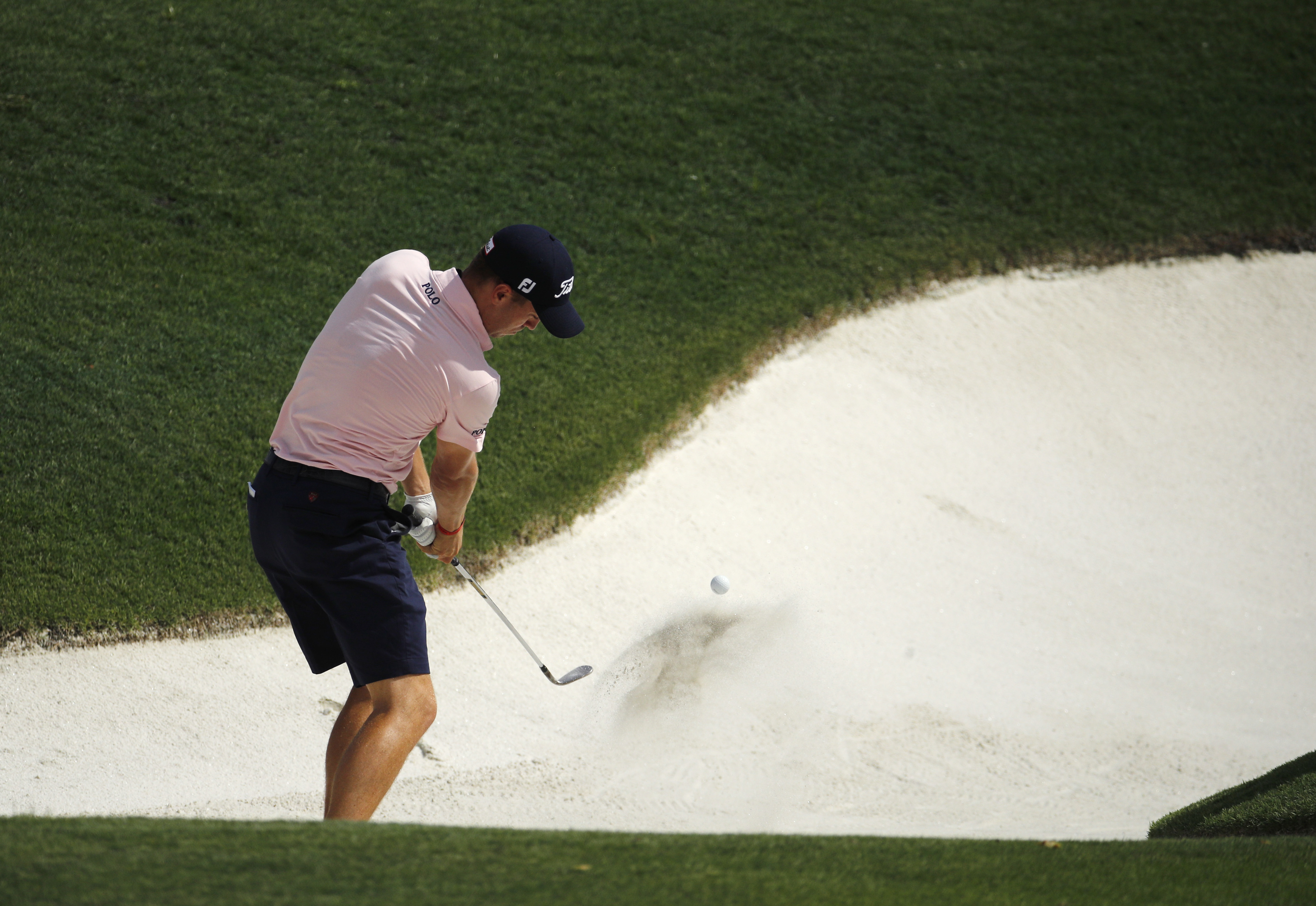 Woodland feels at home in Missouri, leads PGA with 64