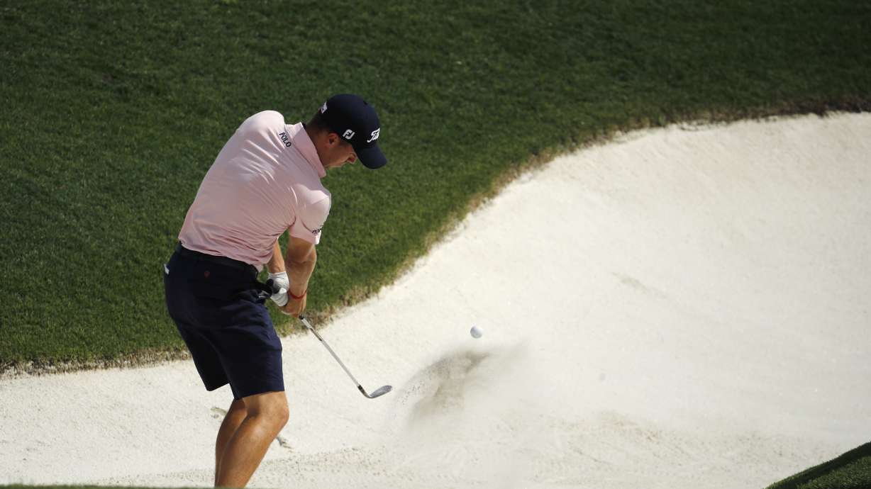 Woodland feels at home in Missouri, leads PGA with 64