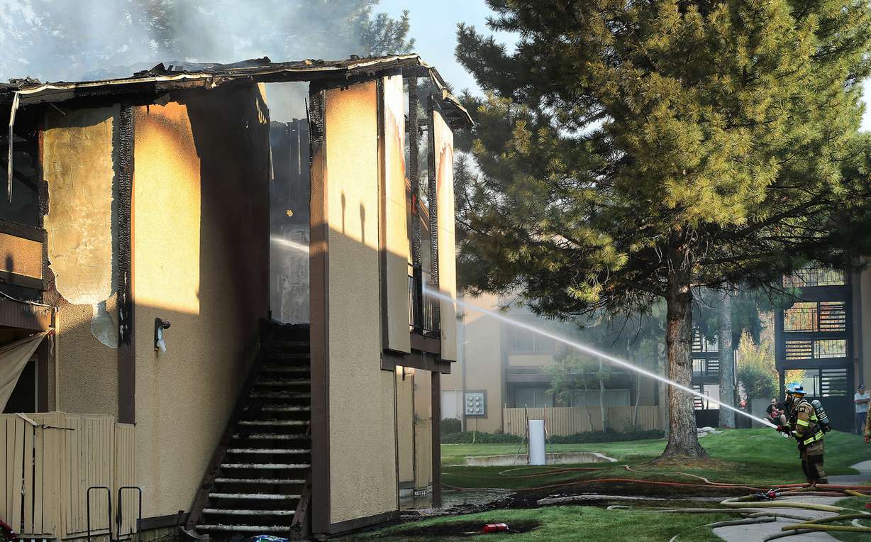 Unified, West Valley and West Jordan firefighters work on a fire at Village Green Apartments in West Valley City on Thursday, Aug. 9, 2018. (Photo: Jeffrey D. Allred, KSL)