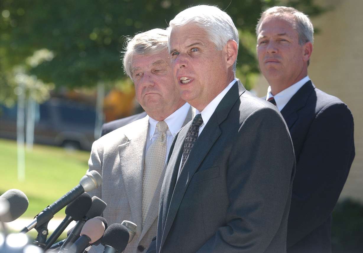 Salt Lake City Police Chief Rick Dinse (middle) , Special Agent in Charge for the FBI James H. Burrus (right), and Salt Lake District Attorney David Yocom (left) give an update on the Elizabeth Smart disappearance case during a press conference in Salt Lake City, Thursday, July 11, 2002. (Photo: Deseret News Archives)