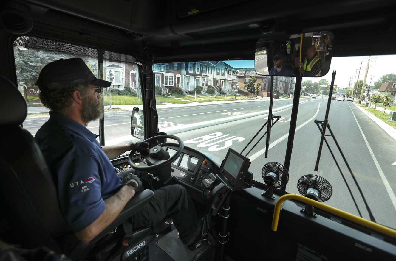 Utah Transit Authority bus operator Briant Thorne drives through a Provo neighborhood in a hybrid electric articulated bus during a test run of the Utah Valley Express on Friday, Aug. 10, 2018. The bus rapid transit line service starts Monday. (Photo: Steve Griffin, KSL)