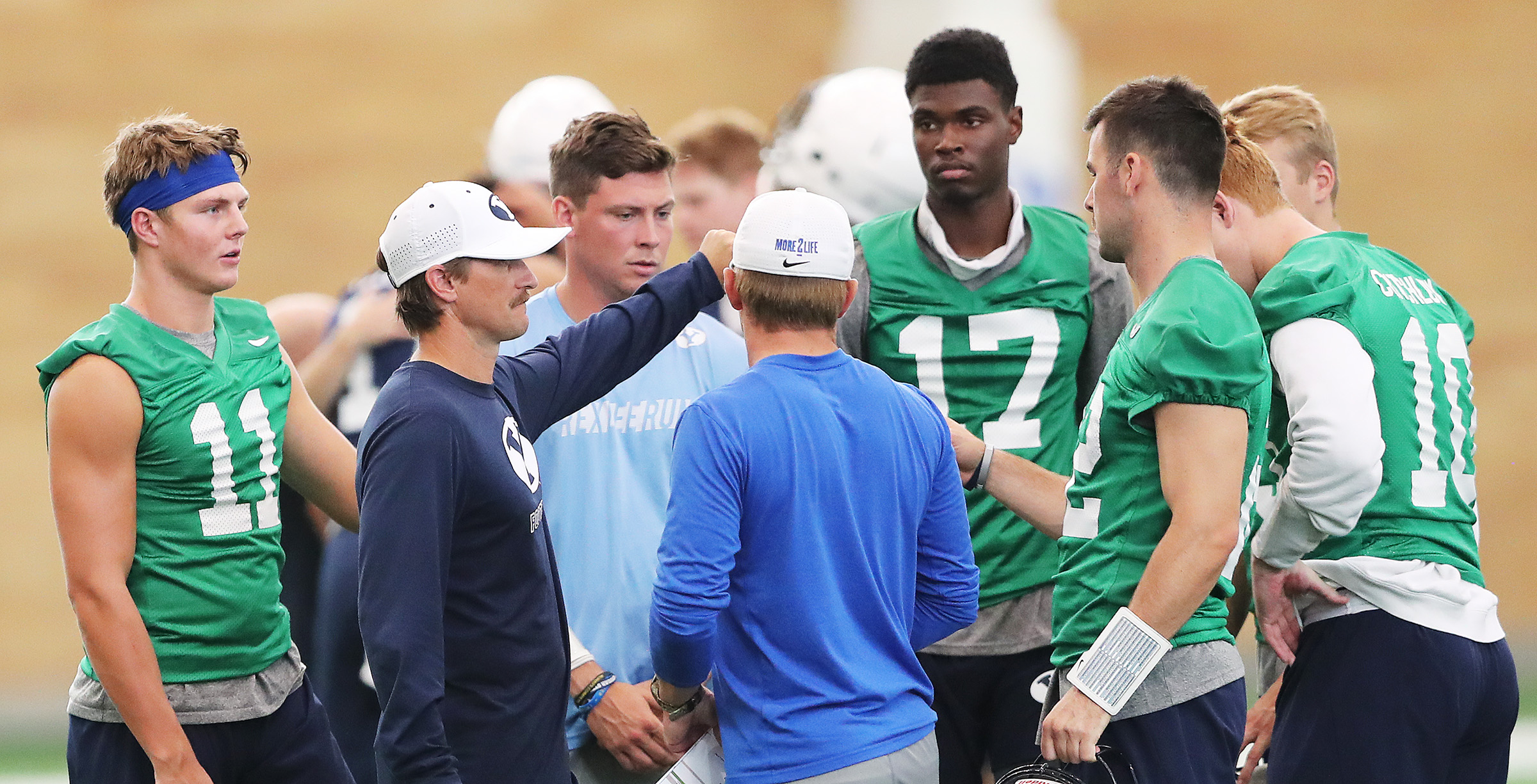 Passing Game Coordinator and Quarterbacks Coach Aaron Roderick gathers his players after a walkthrough in their indoor practice facility in Provo on Friday, Aug. 10, 2018. (Photo: Scott G Winterton, Deseret News, File)