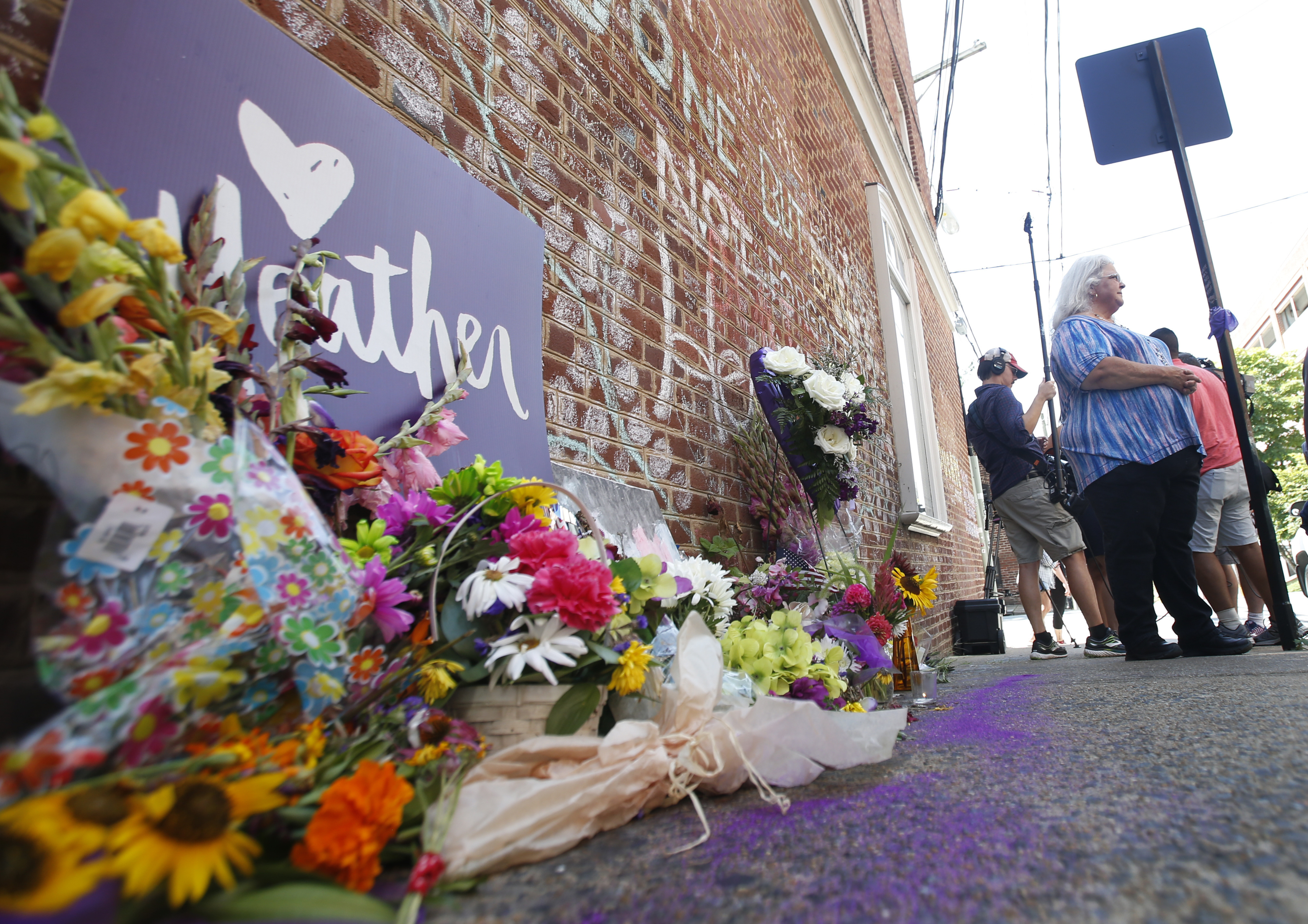 Tense confrontation amid peaceful vigils in Charlottesville